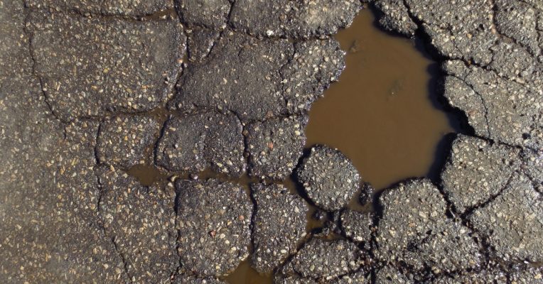 How to Prevent and Repair Common Asphalt Issues Like Cracks and Potholes